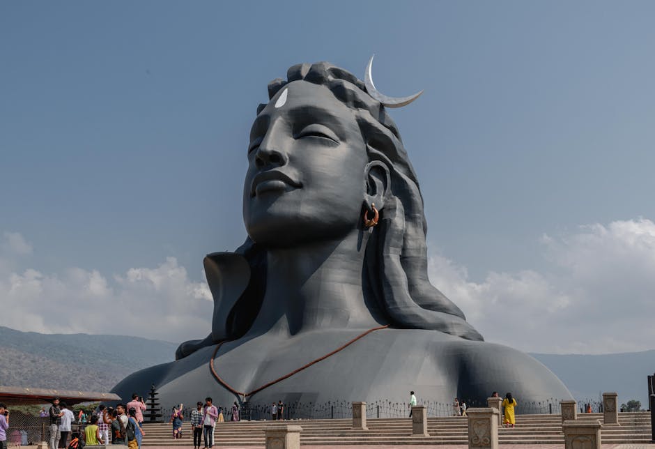 The Adiyogi statue stands prominently at Isha Foundation in Coimbatore, India, against a clear sky.